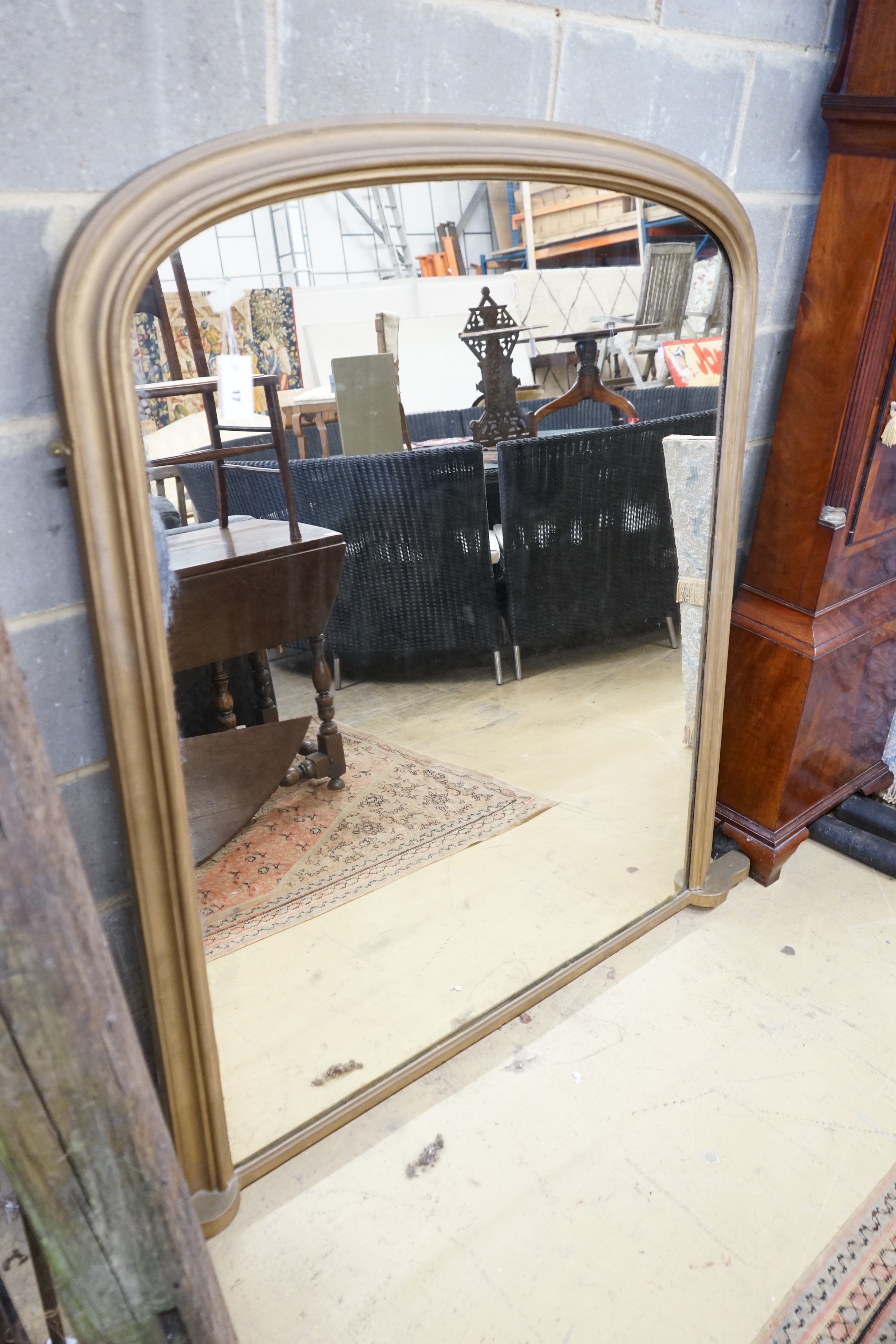 A Victorian gilt framed overmantel mirror, re-painted, width 124cm, height 149cm